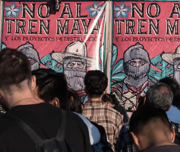 Uno striscione " No al Tren Maya"